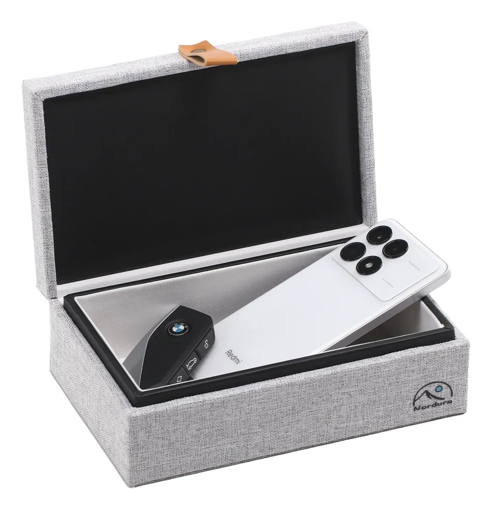 Entire Nordura signal-shielding box with lid open, car key and smartphone inside