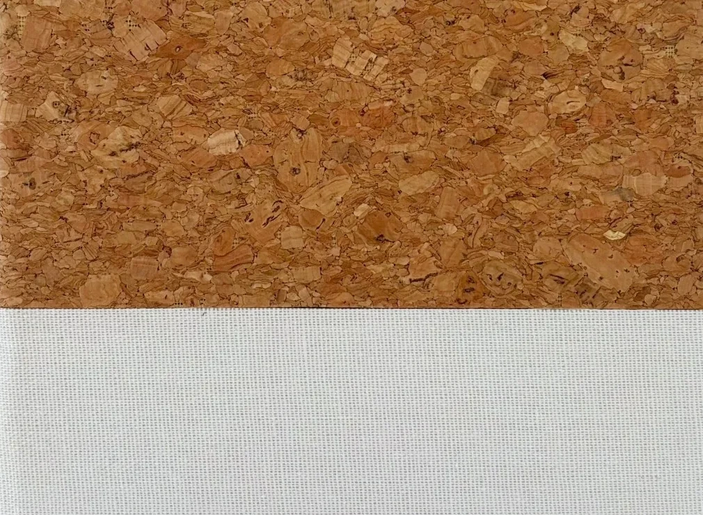 Close-up of cork and linen on a notebook